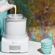 Pouring milk into an ice cream maker